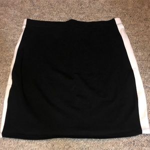 Black pencil skirt with white strips on the sides
